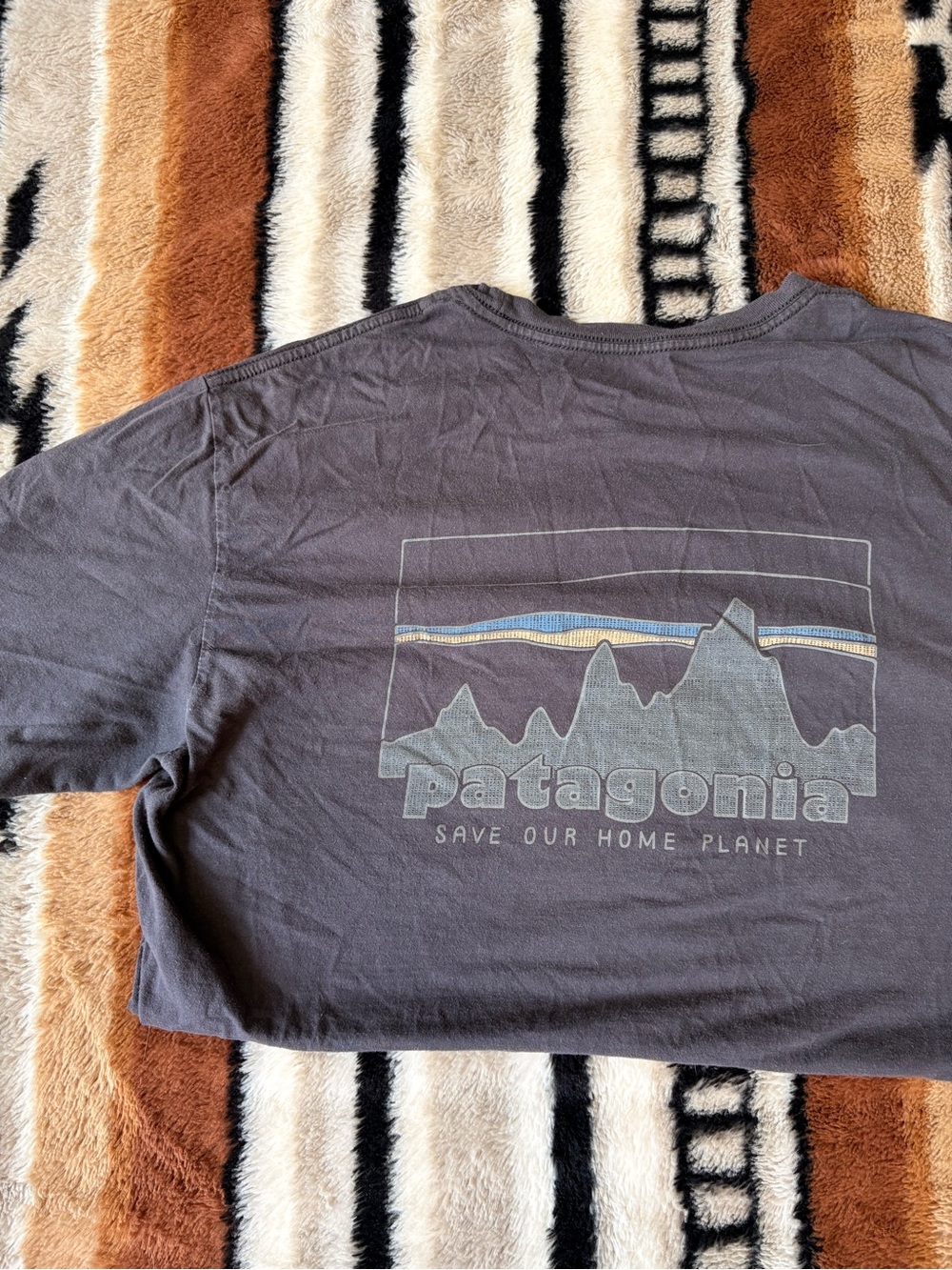 T-shirt on a rug
